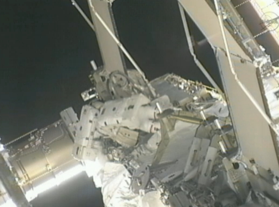 Spacewalking Astronauts Isolate Leak in Space Station Cooling System